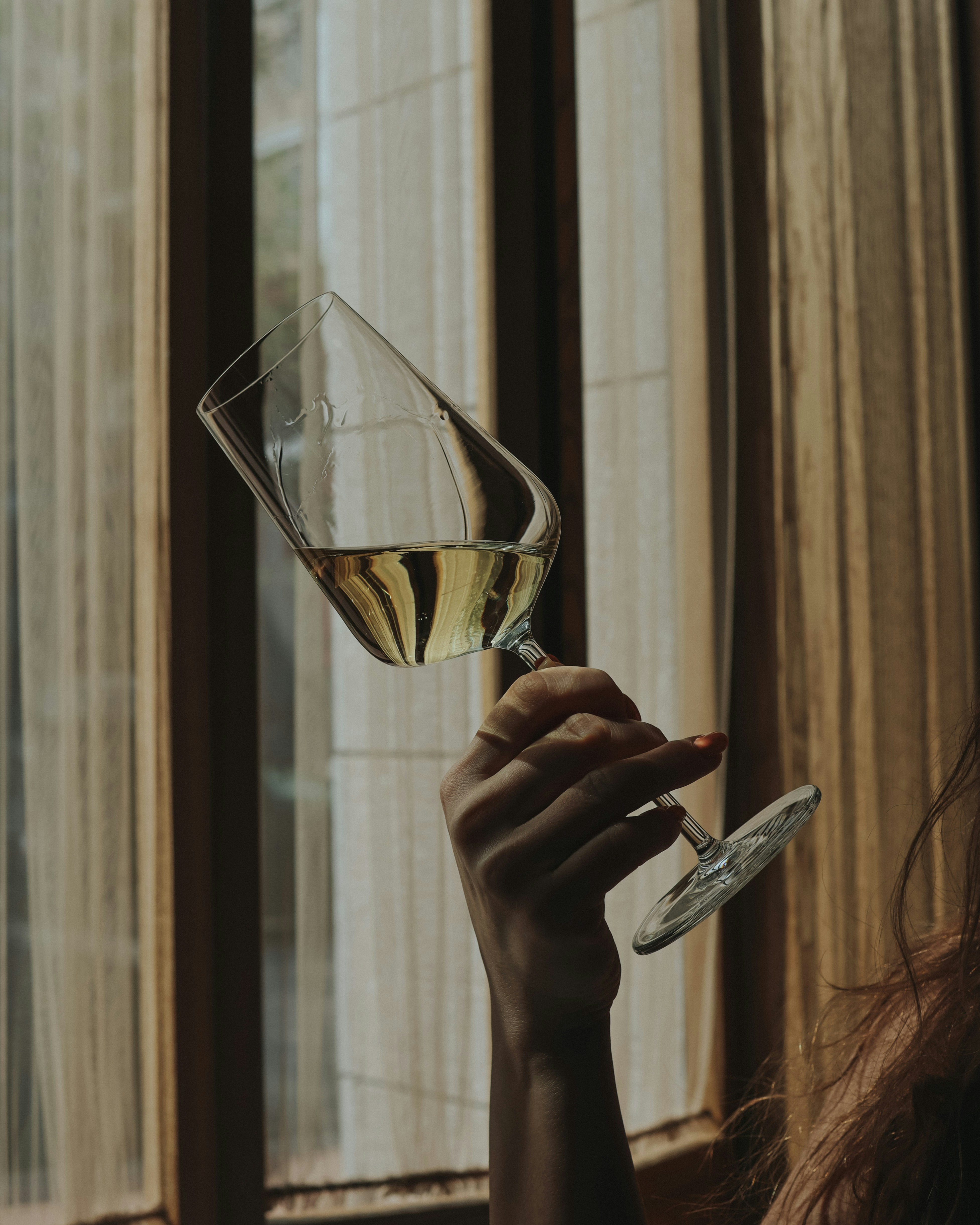 Ever Wonder Why People Look So Closely at Their Glass of Wine?
