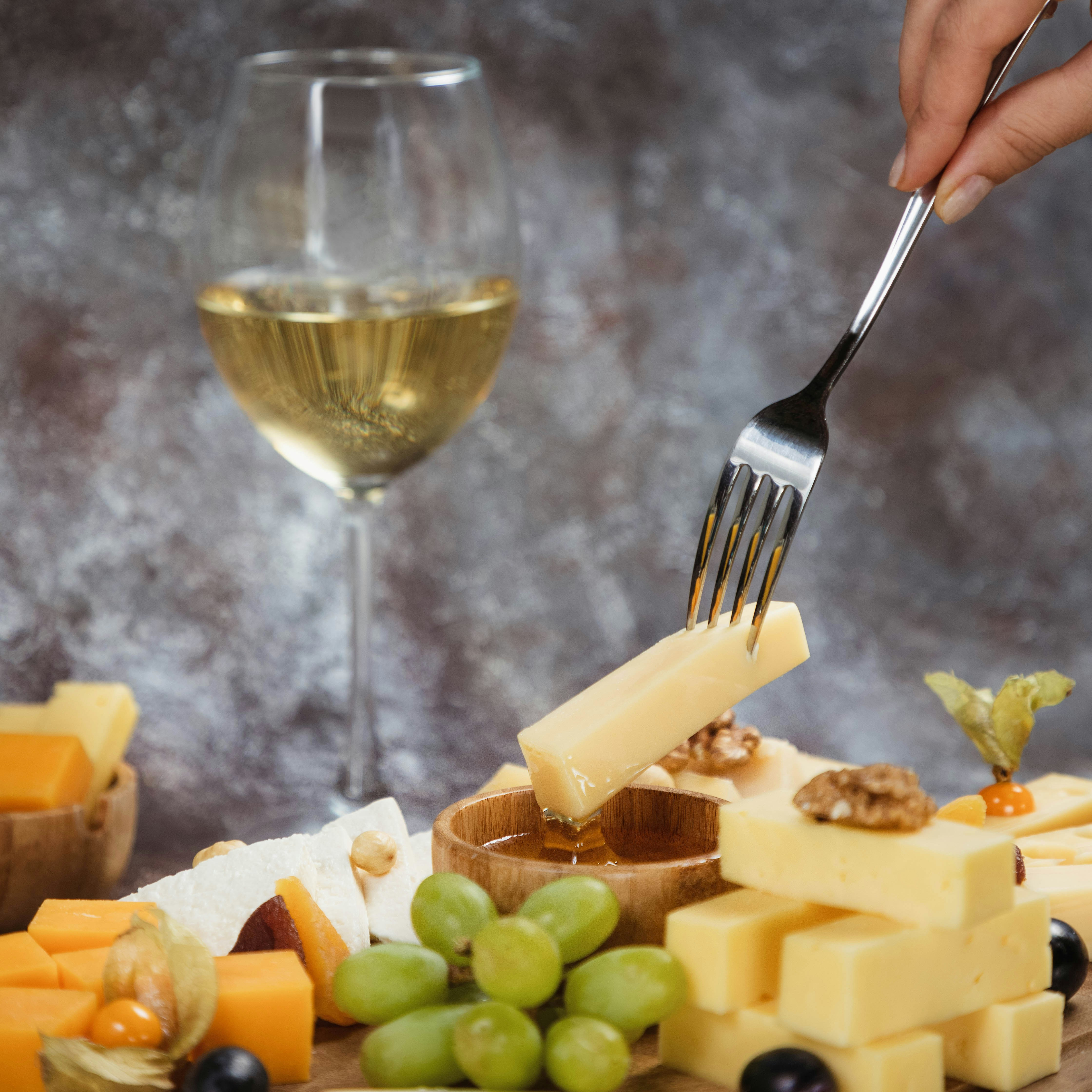 Ever Wonder Why Wine and Cheese Pair So Well?
